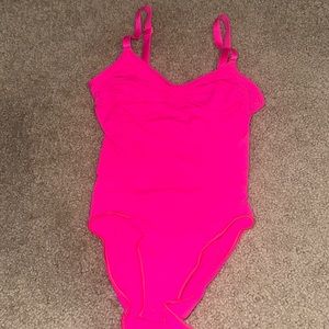 Skims bright pink seamless sculpt brief bodysuit, Size S/M